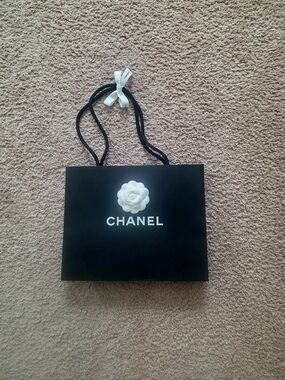 CHANEL Black Tote with White Camellia Logo